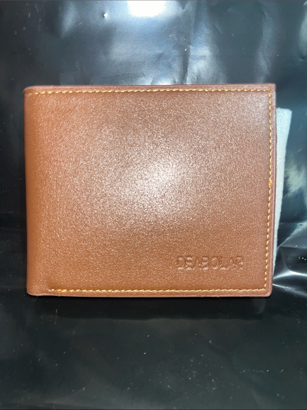 Debossed Leather Bifold Wallet in Warm Brown